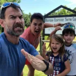 y Dryen and his family posing at Western Kentucky Youth Camp, capturing a memorable moment of togetherness and enjoyment at the camp.