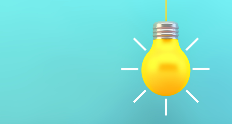 An animated cartoon lightbulb, possibly with a glowing filament or creative elements, representing ideas, innovation, and inspiration.